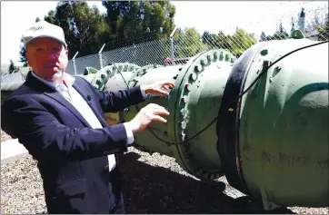  ?? ANDA CHU — STAFF ARCHIVES ?? Alameda County Water District General Manager Robert Shaver, talking about a water pipe in Fremont in April 2018, said Tuesday that he feels good about his ability to retire in July because the water district is in good fiscal shape.