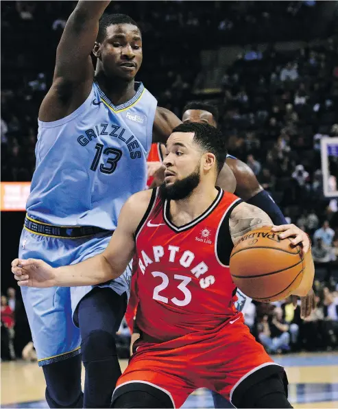  ?? — THE ASSOCIATED PRESS ?? Toronto Raptors guard Fred VanVleet drives against Memphis Grizzlies forward Jaren Jackson Jr. in the first half of an NBA basketball game on Tuesday in Memphis, Tenn.