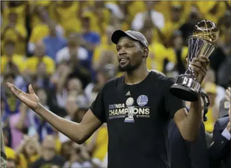  ?? THE ASSOCIATED PRESS ?? Kevin Durant re-signed with the Warriors on a two-year deal worth $53 million.