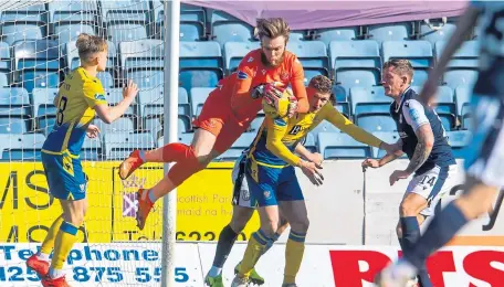  ??  ?? Dundee’s Danny Mullen had this “goal” chalked off