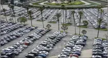  ?? ROBERT GAUTHIER/LOS ANGELES TIMES/TNS ?? Cars are stored at Santa Anita racetrack lot. To get a car you want, it’s often a matter of timing.