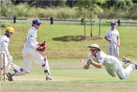  ?? PHOTO: NEV MADSEN ?? WHAT A CATCH: Highfields Railways’ Kurtley Nielsen catches Northern Brothers Diggers batsman Brandon Walker out in the second day of the two-day competitio­n game at the weekend.