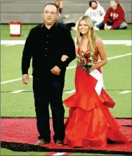  ??  ?? Farmington sophomore maid Emma Grace Ortiz, daughter of Noel and Angela Ortiz, escorted by her father, Noel Ortiz.