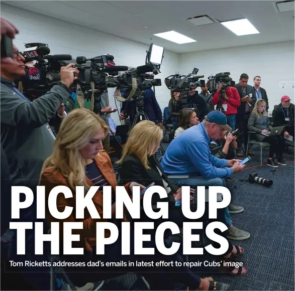  ?? MORRY GASH/AP ?? Cubs chairman Tom Ricketts answers questions from a throng of media members during a news conference Monday in Mesa, Ariz.