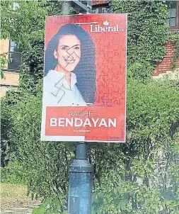  ??  ?? Rachel Bendayan's campaign sign in Montreal is defaced with a swastika.