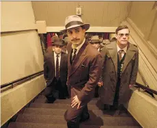  ?? THE ORCHARD ?? Gael Garcia Bernal, centre, plays a police officer in the new film Neruda.