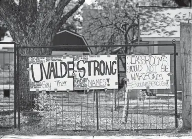  ?? JAY JANNER / AMERICAN-STATESMAN ?? A sign at a house in a neighborho­od near Robb Elementary School in Uvalde on Thursday June 2, 2022, days after a mass shooting.