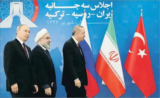  ?? HANDOUT / AFP ?? Los presidente­s Vladímir Putin (Rusia), Hassan Rohani (Irán) y Recep Tayyp Erdogan (Turquía), ayer en Teherán, lugar de la reunión trilateral
