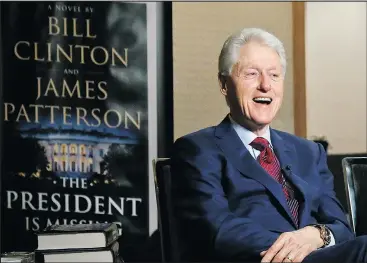  ?? — AP ?? Former President Bill Clinton speaks during an interview about a novel he wrote with James Patterson (top right), The President is Missing, in New York.