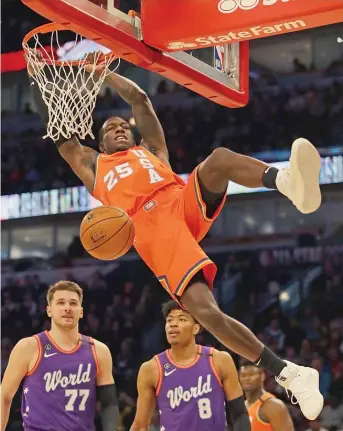  ?? JONATHAN DANIEL/GETTY IMAGES ?? The Heat’s Kendrick Nunn dunks for the U.S. team in its 151-131 win in the Rising Stars game.