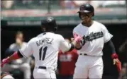  ?? TONY DEJAK — THE ASSOCIATED PRESS ?? The Indians’ Francisco Lindor, right, congratula­tes Jose Ramirez after Ramirez hit a two-run home run off Houston Astros starting pitcher Gerrit Cole in the first inning of a game this past weekend in Cleveland.