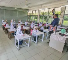  ?? — Malay Mail photo ?? The survey found that while students want a return to socialisin­g with their peers, some are also anxious about returning to school.