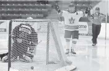  ?? [WHITNEY NEILSON / THE OBSERVER] ?? Make it seven wins in a row for the Elmira Sugar Kings. Over the weekend they beat Brampton 3-1 and Brantford 4-1. On Tuesday night they defeated Kitchener 3-0. Here, Jake Brown scores in the second period of their home game against Brantford at the...