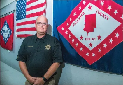  ?? WILLIAM HARVEY/RIVER VALLEY & OZARK EDITION ?? Robert Edwards stands in the Faulkner County coroner’s office in Conway. Edwards, a deputy coroner, was named interim coroner by Faulkner County Judge Jim Baker after longtime coroner Patrick Moore died on Sept. 4. Edwards said he and Moore worked...