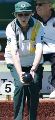  ??  ?? Left: Warragul third Marj Evison prepares to bowl against Yinnar on Tuesday. Warragul’s overall win lifted it to fifth on the division two ladder in a close competitio­n.
Right: Warragul skip Roma Rippon sends down a bowl against Yinnar in division...