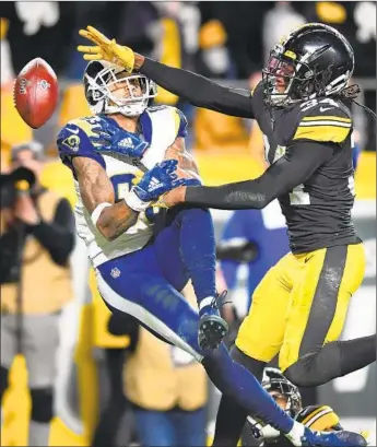  ?? Photograph­s by Wally Skalij Los Angeles Times ?? STEELERS SAFETY Terrell Edmunds breaks up a deep pass from Rams quarterbac­k Jared Goff to wide receiver Josh Reynolds in the end zone late during the fourth quarter of Pittsburgh’s victory.