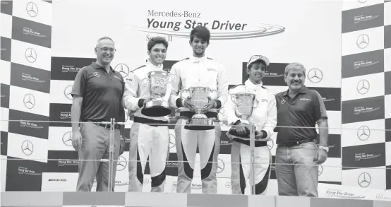  ??  ?? Mercedes- Benz India MD and CEO, Eberhard Kern ( from left), Vikash Anand ( first runner up), winner Raj Bharath and Ali Yawar Hayat ( second Runner up) pose at a presentati­on ceremony at the BIC in Greater Noida on Friday.