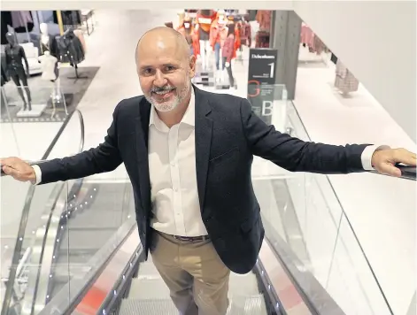  ?? REUTERS ?? Sergio Bucher, CEO of Debenhams Plc, poses for a photograph inside the company’s new store in Watford, Britain on Monday.