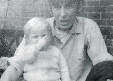  ?? CLEVELAND POLICE ?? Paul Booth, seen just weeks before his death at 19 months, with David Dearlove, who stands accused of murder.