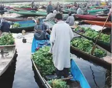  ??  ?? The Dal Lake is known as ‘Srinagar’s Jewel’ because of its scenic beauty and it is a tourist hotspot in Kashmir. The floating market, one of its kind in India, gives visitors a unique experience. This picture is by Najmus Saqib.