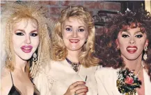  ??  ?? ‘The Cemetery Angel’: Ruth Coker Burks, centre, with Miss Sookie Simone (left) and Miss Lena London, the reigning Miss Gay Arkansas, in Little Rock, 1991