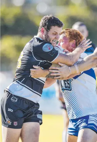  ?? Picture: JERAD WILLIAMS ?? Tweed’s Josh Harvey can’t get past some heavy Tugun defence.