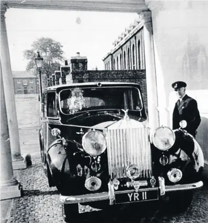  ??  ?? Fred and his Rolls Royce with the Distictive Duke of Kent registrati­on number YR 11 seen here at Kensington Palace in 1957