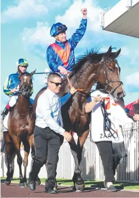  ?? Picture: Trackside Photograph­y ?? Zaaki reminds James McDonald of Hartnell.