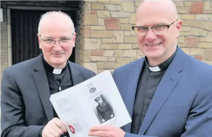  ??  ?? New initiative Father Paul Morton, pictured here with Rev Leslie Milton, has establishe­d the Eat Up plan