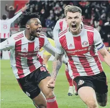  ??  ?? Max power celebrates his late, late goal against Fleetwood Town.