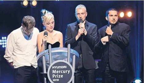  ?? Picture: PA. ?? Wolf Alice accept the 2018 Hyundai Mercury Music Prize.