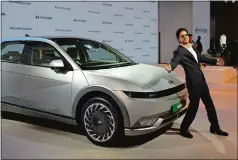  ?? ALTAF QADRI/AP PHOTO ?? Bollywood actor and brand ambassador of Hyundai Shah Rukh Khan gestures during the launch of IONIQ 5 at the Auto Expo, in Greater Noida, near New Delhi, India, on Jan. 11.