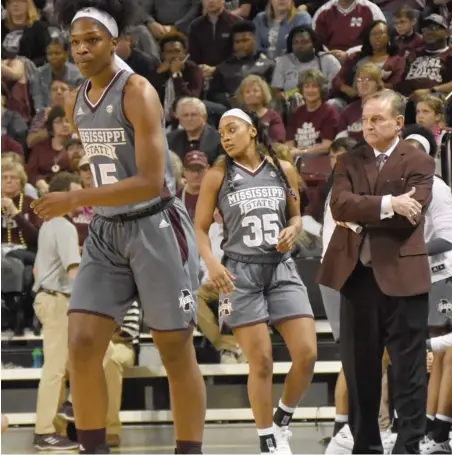  ?? (Photo by Jason Cleveland, SDN) ?? Mississipp­i State head women’s basketball coach Vic Schaefer, right, watches his players perform during Sunday’s game against Kentucky.