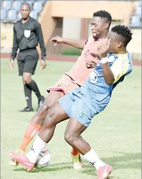  ?? (Pic Mengameli Mabuza) ?? Young Buffaloes attacking midfielder Sandile ‘Saviola’ Gamedze fighting for the ball with Denver Sundowns defender Kwanele Dlamini. This was during yesterday’s MTN Premier League match at Mavuso Sports Centre. Buffaloes won the match 2-1.