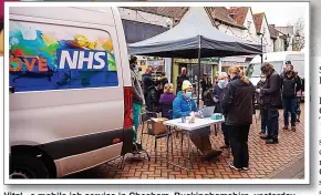  ?? ?? Vital...a mobile jab service in Chesham, Buckingham­shire, yesterday