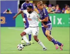  ?? JOHN RAOUX — THE ASSOCIATED PRESS ?? Union midfielder and Georgia native Warren Creavalle, left, is looking forward to Wednesday’s chance to take on Atlanta United in their palatial new stadium that has drawn record-breaking crowds.