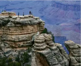  ?? JOHN BURCHAM/NEW YORK TIMES ?? Rangers have also dealt with people tossing baseballs, soccer balls, and other objects into the canyon.