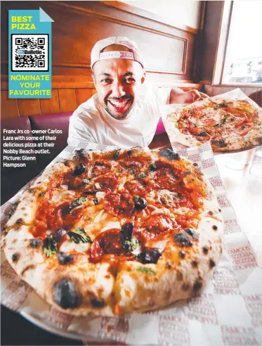  ?? Picture: Glenn Hampson ?? Franc Jrs co -owner Carlos Lara with some of their delicious pizza at their Nobby Beach outlet.