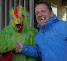  ??  ?? Davy Fitzgerald meets a new feathered friend, Claire Kehoe from Cloughbawn, in Innovate Wexford Park on Sunday.