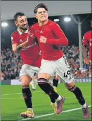  ?? AFP ?? Manchester United's Alejandro Garnacho (R) celebrates after scoring against Fulham at Craven Cottage in London.