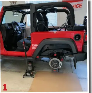  ??  ?? 1. Secure a jack stand under the side of the rear axle that needs to be repaired. This will raise the wheel slightly and prevent gear oil from running out of the axle tube once the axle is pulled. Cleanlines­s is next to godliness when doing mechanical repairs – not only for convenienc­e, but it keeps the surfaces of moving parts as clean as possible during reassembly.