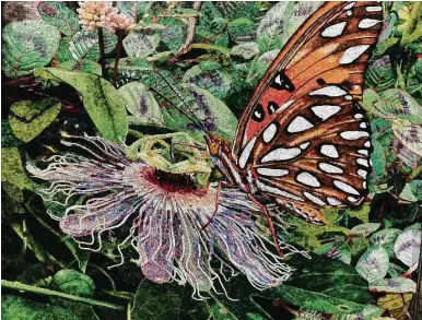  ?? Courtesy photo ?? A Gulf fritillary butterfly lights on a passion flower in one section of Dixie Friend’s mosaic wall at Midtown Park.