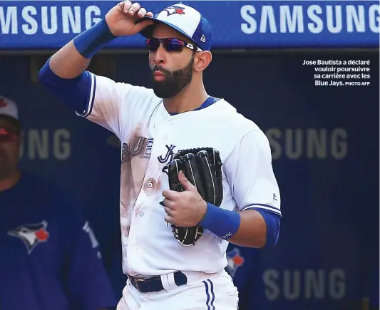  ?? PHOTO AFP ?? Jose Bautista a déclaré vouloir poursuivre sa carrière avec les Blue Jays.