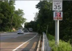  ?? KEVIN TUSTIN - DIGITAL FIRST MEDIA ?? This electronic speed limit radar sign shows a car driving 36 miles per hour on northbound Township Line Road in Drexel Hill. A “slow down” sign will flash under the speed limit when drivers are going over the limit.