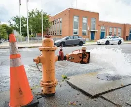  ?? ?? Baltimore’s DPW has sampled several locations in District 9 and found bacteria in the water. Above is a fire hydrant outside BCPD’s Western District headquarte­rs on North Mount Street.