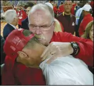  ?? Associated Press ?? CONSOLING — Kansas City Chiefs head coach Andy Reid, rear, puts his arm around San Francisco 49ers head coach Kyle Shanahan after the Chiefs defeated the 49ers 31-20 in Super Bowl 54 on Sunday in Miami Gardens, Florida.