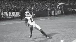  ?? The Associated Press ?? RAM MODE: Los Angeles cornerback Marcus Peters celebrates in the end zone Monday after making a 50-yard intercepti­on for a touchdown during the second half of the Rams’ 33-13 win against the Raiders in Oakland, Calif.