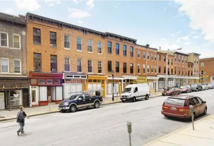  ?? AMY DAVIS/BALTIMORE SUN ?? The buildings from 1019 to 1041 W. Baltimore St. are getting fresh storefront facades, thanks to a grant from the city.