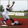  ?? RANDY MEYERS — THE MORNING JOURNAL ?? Crushers third baseman Cody Lenahan reaches for a throw as the Wild Things’ Rashad Brown slides in a recent game.