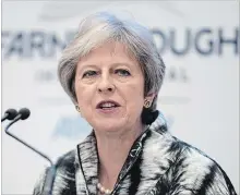  ?? MATT CARDY GETTY IMAGES ?? British Prime Minister Theresa May opened the Farnboroug­h Airshow with a speech pledging funding for the aerospace industry.